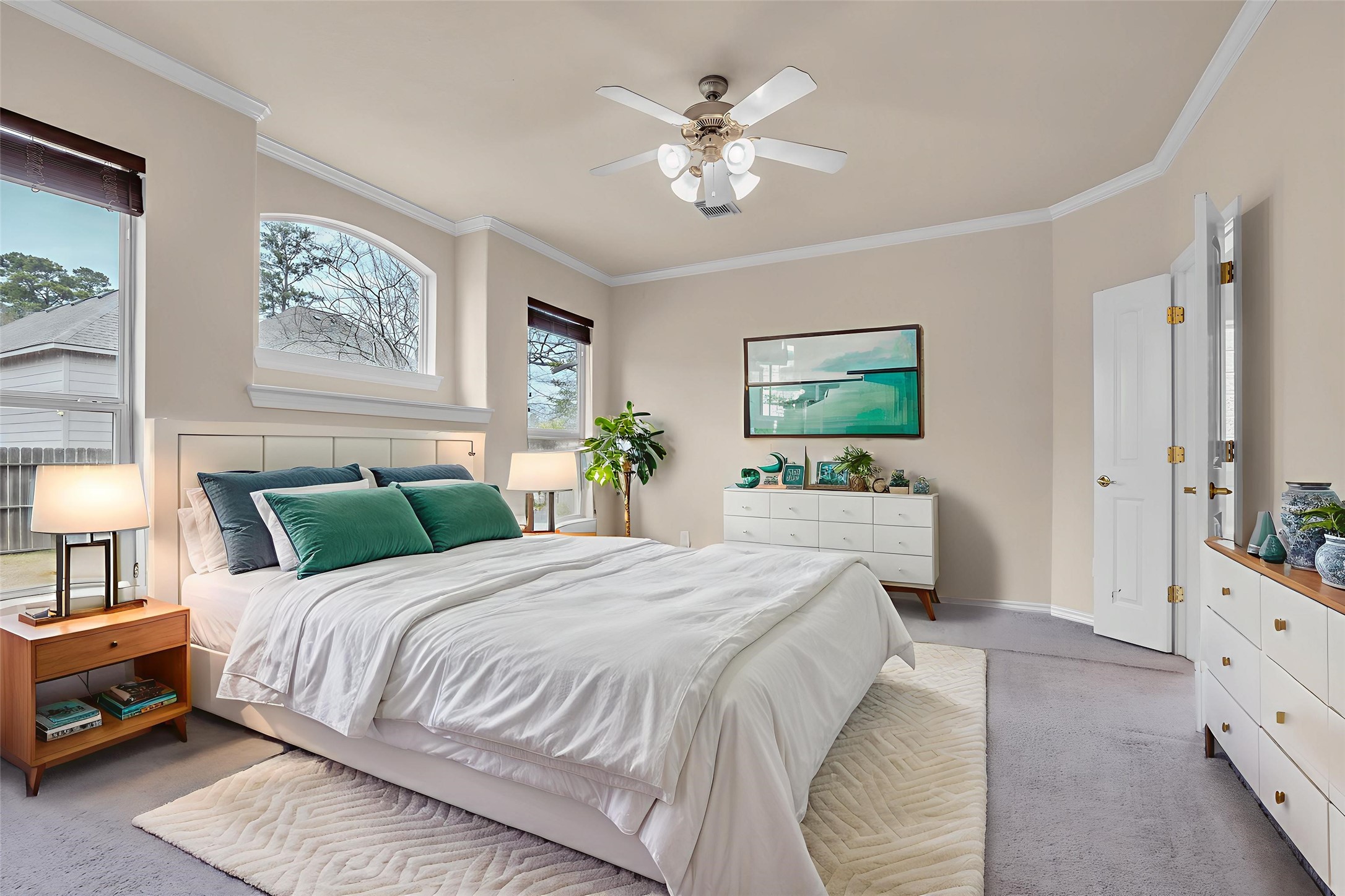 629 Spring Forest Drive Conroe, TX 77302 - Photo 7 of 38 a bedroom with a large bed and a chandelier