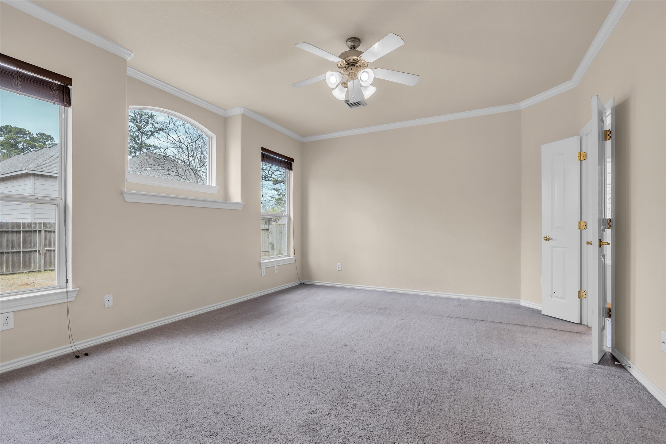 629 Spring Forest Drive Conroe, TX 77302 - Photo 8 of 38 a view of an empty room with a window