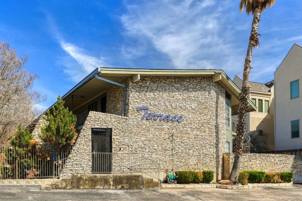 a view of a building with a street