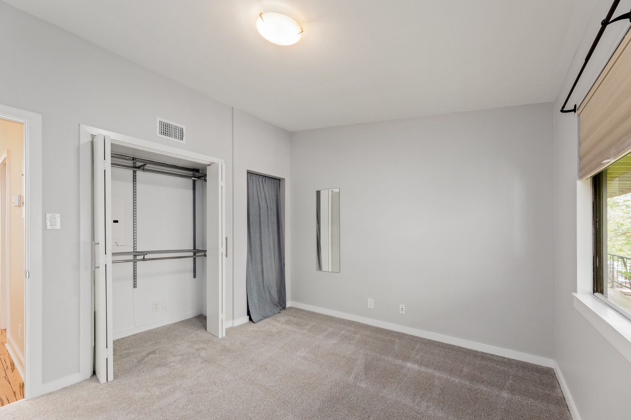 2308 Enfield Road, Unit 204 Austin, TX 78703 - Photo 19 of 30 a view of an empty room