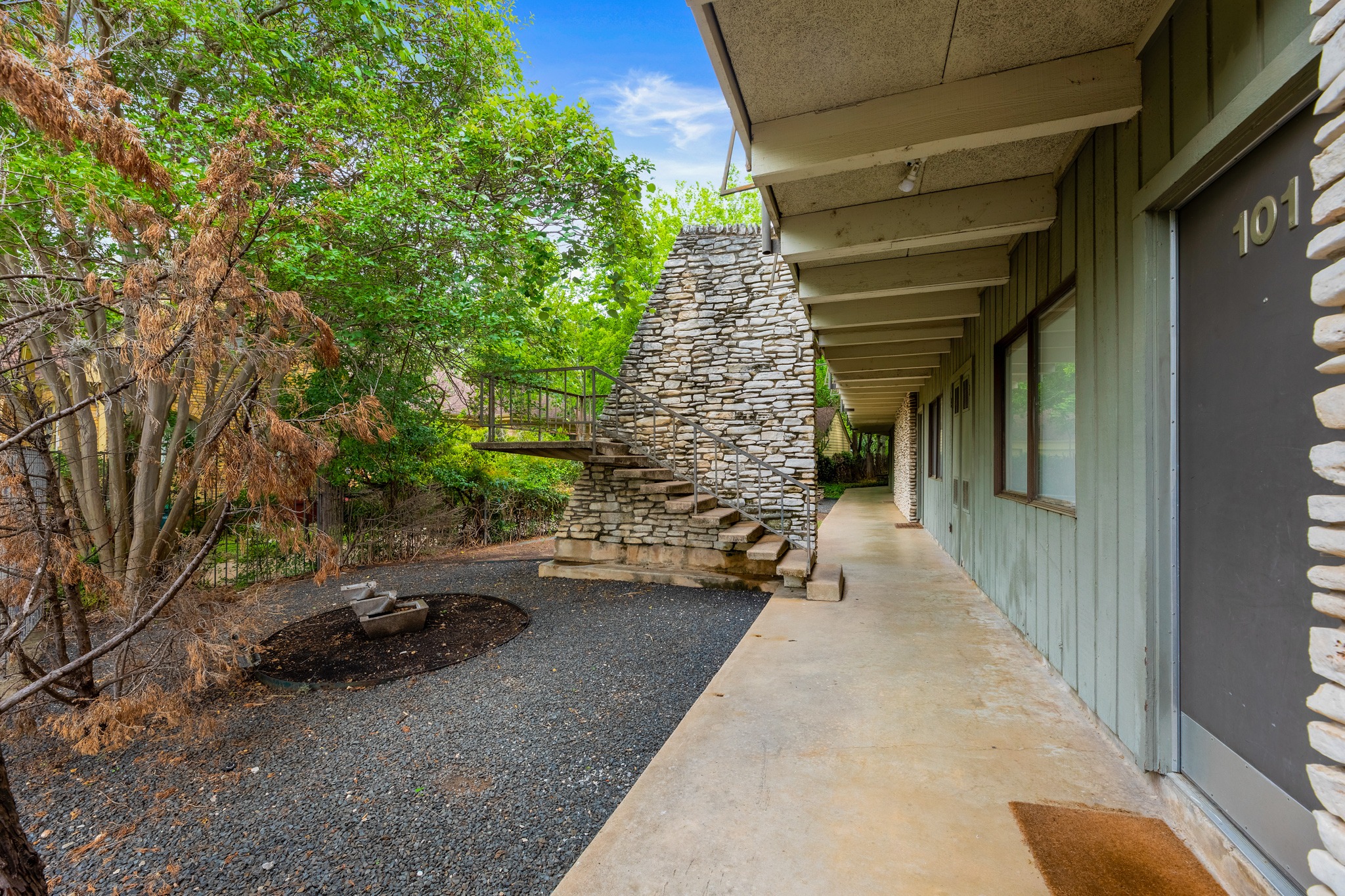2308 Enfield Road, Unit 204 Austin, TX 78703 - Photo 2 of 30 a view of a porch with furniture and a yard