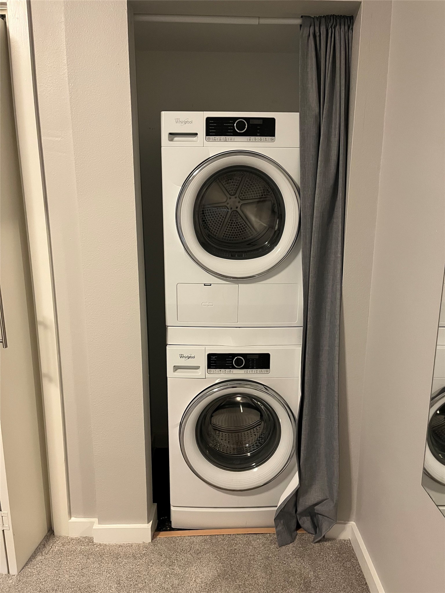 2308 Enfield Road, Unit 204 Austin, TX 78703 - Photo 22 of 30 a utility room with dryer and washer