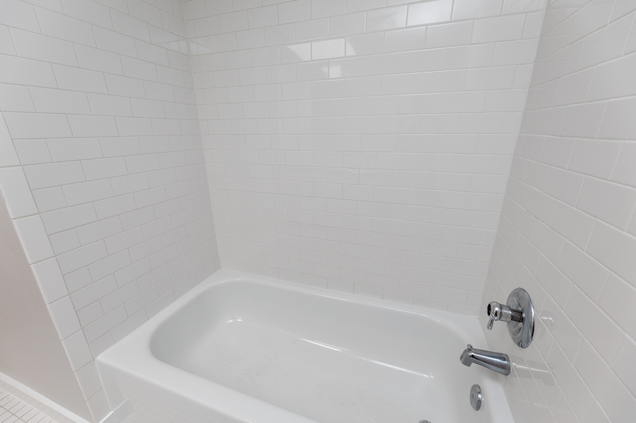 2308 Enfield Road, Unit 204 Austin, TX 78703 - Photo 24 of 30 a close up of a bathtub in a bathroom