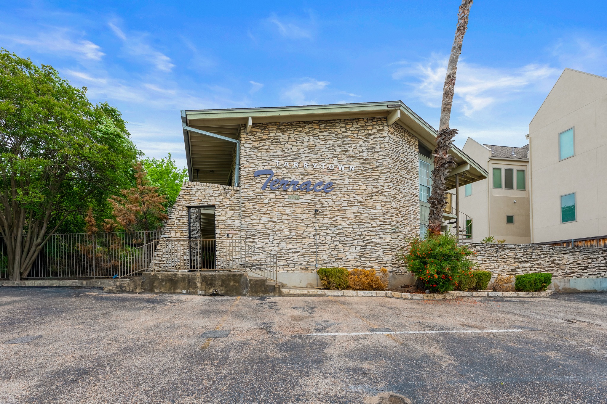 2308 Enfield Road, Unit 204 Austin, TX 78703 - Photo 30 of 30 a view of a house with a backyard