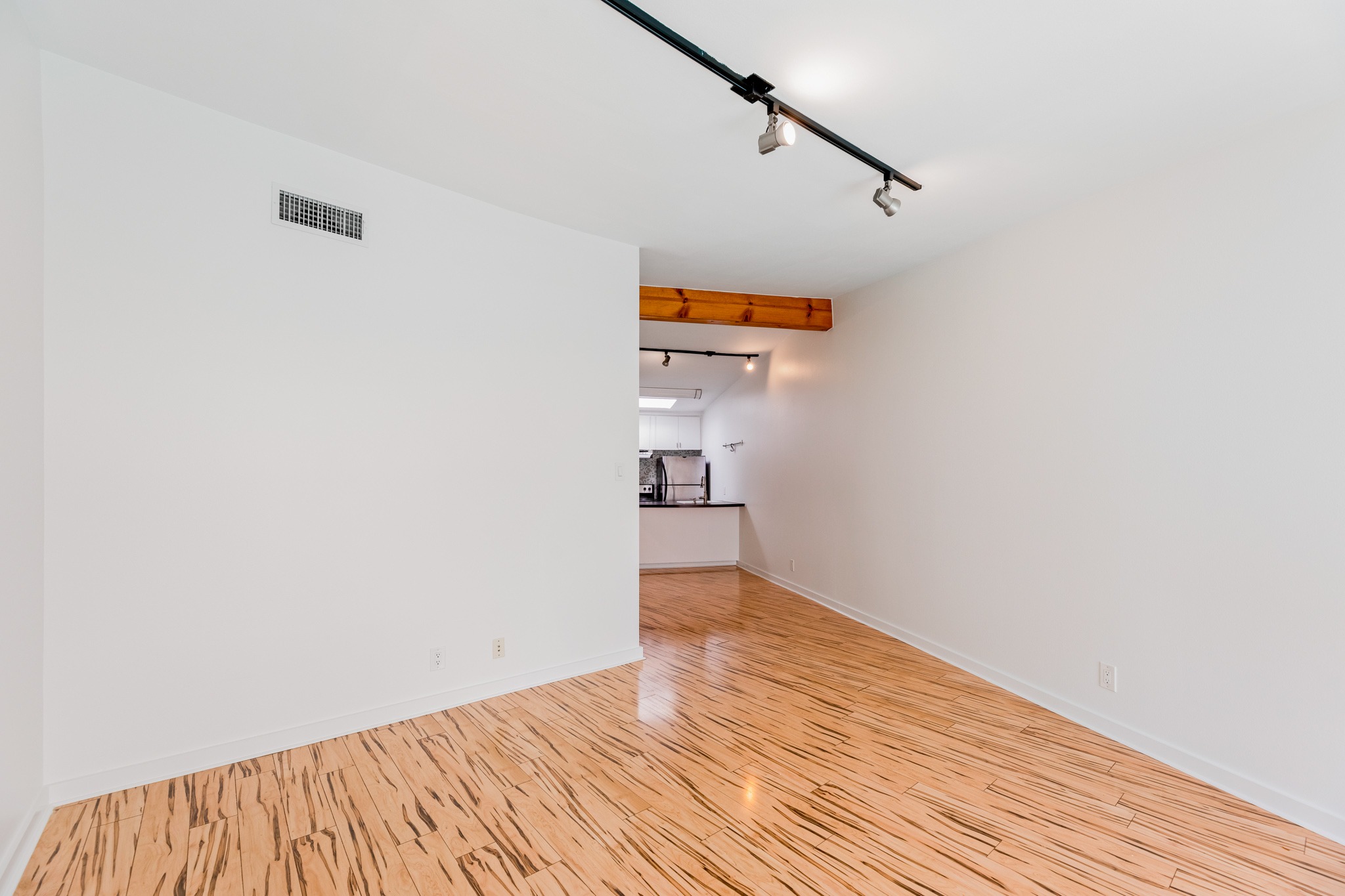 2308 Enfield Road, Unit 204 Austin, TX 78703 - Photo 7 of 30 a view of a room with wooden floor and staircase