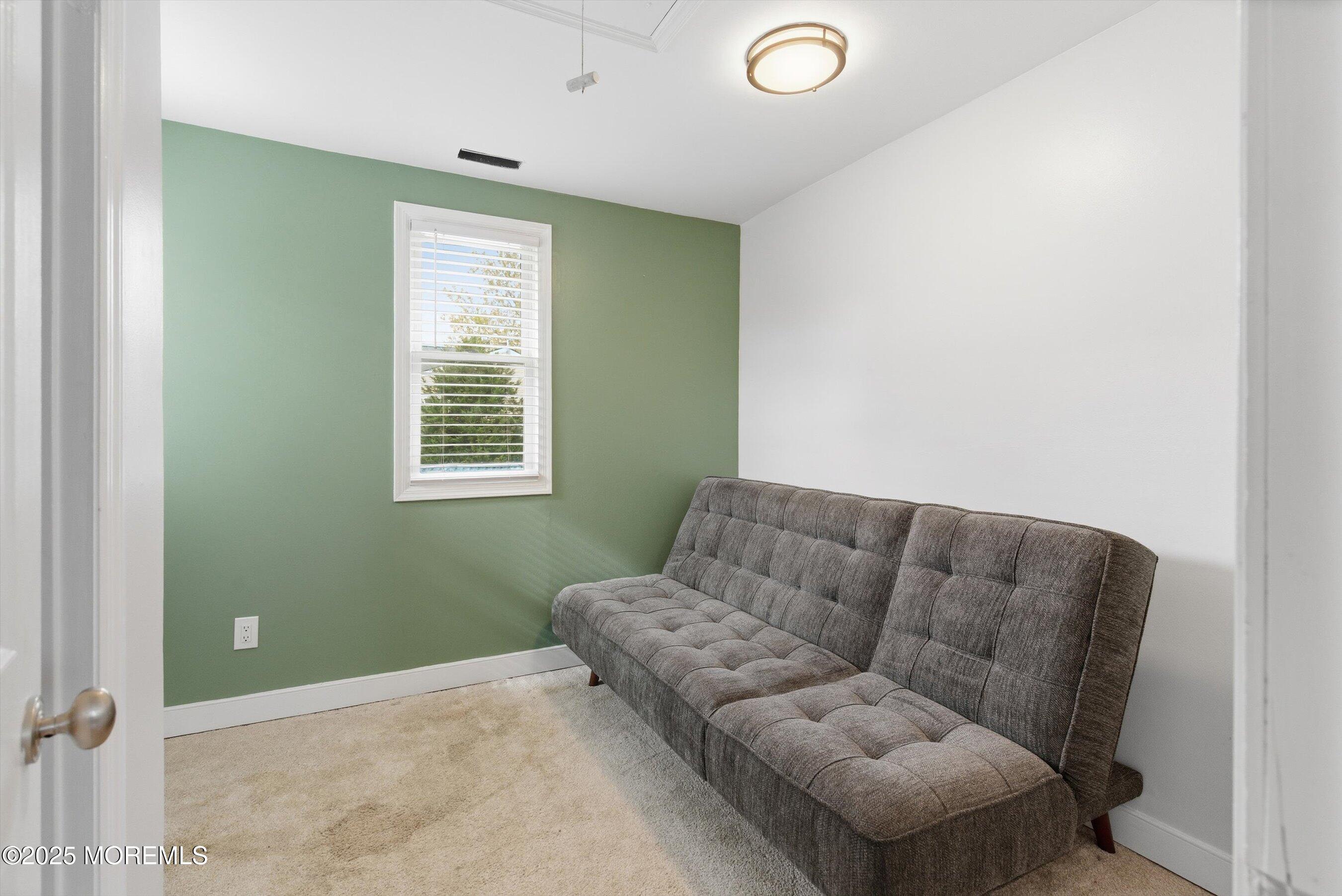 625 Drum Point Road Brick, NJ 08723 - Photo 11 of 22 a living room with furniture and a window