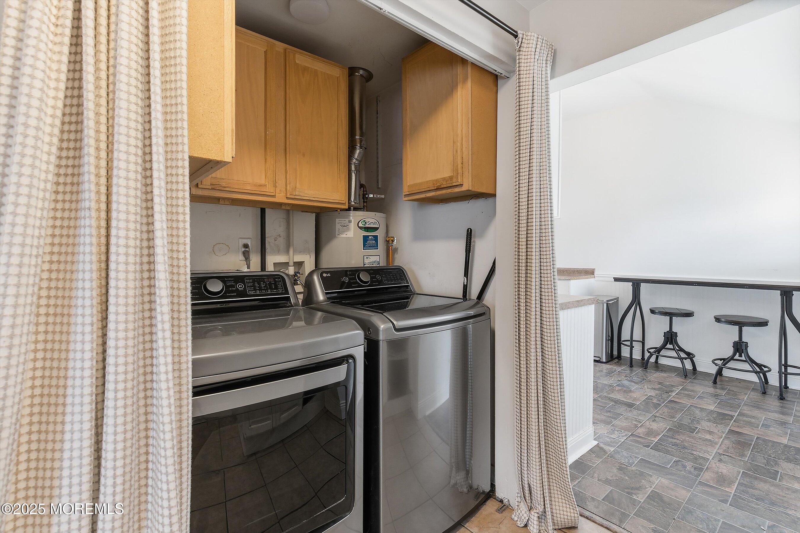 625 Drum Point Road Brick, NJ 08723 - Photo 6 of 22 a kitchen with stainless steel appliances granite countertop a stove a sink and a refrigerator