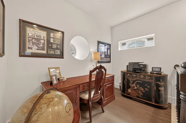 a view of a workspace with furniture