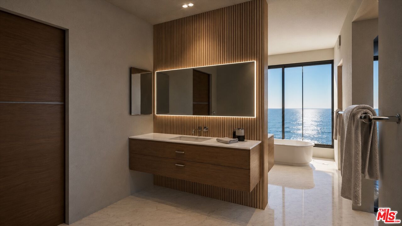 25260 Malibu Road Malibu, CA 90265 - Photo 12 of 13 a bathroom with a sink and a mirror