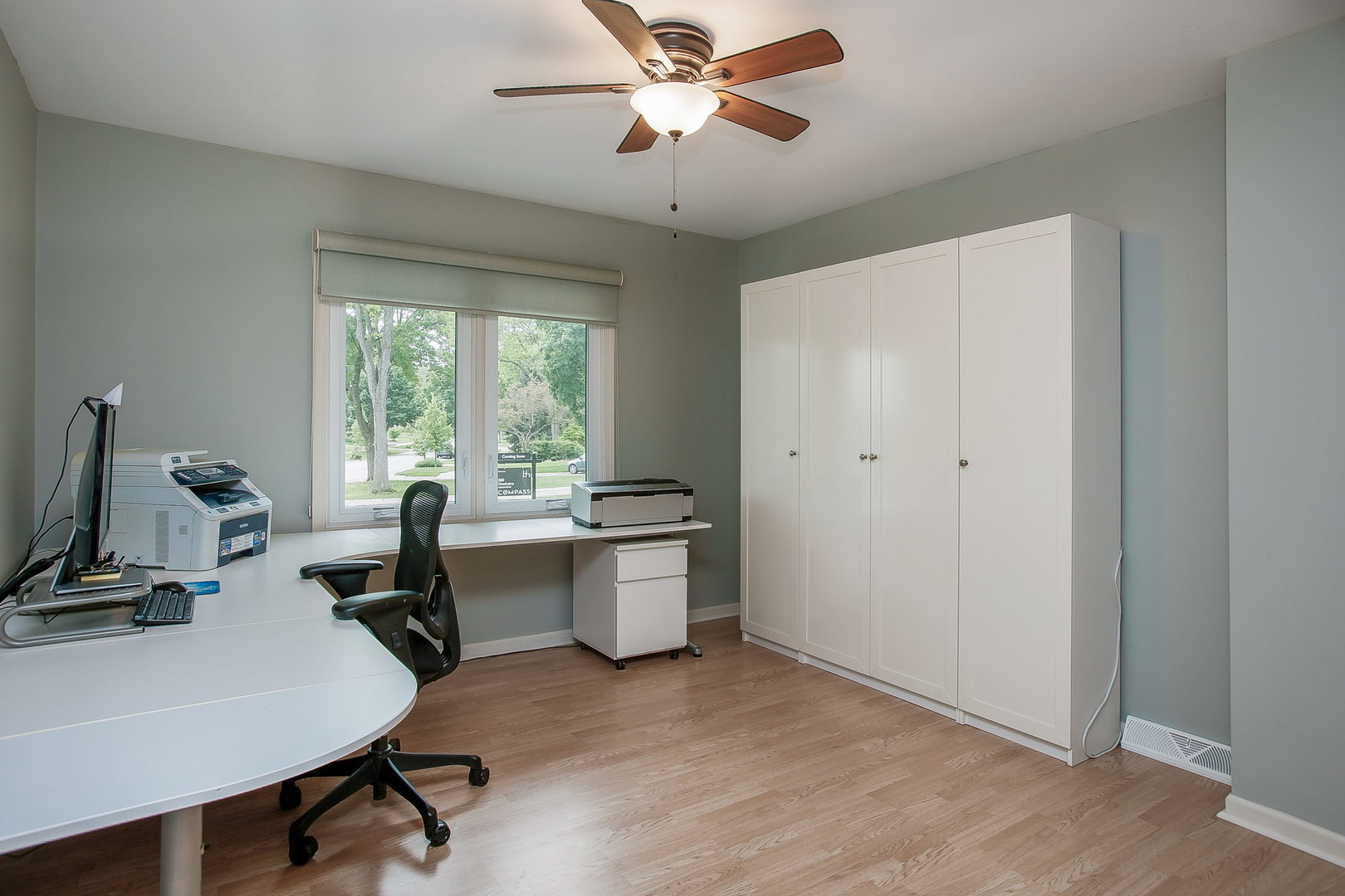 110 Stuarton Drive Wheaton, IL 60189 - Photo 15 of 30 a view of a workspace with furniture and a window