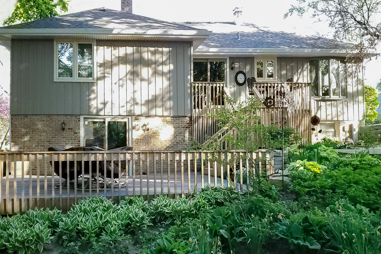 110 Stuarton Drive Wheaton, IL 60189 - Photo 21 of 30 a front view of a house with a porch