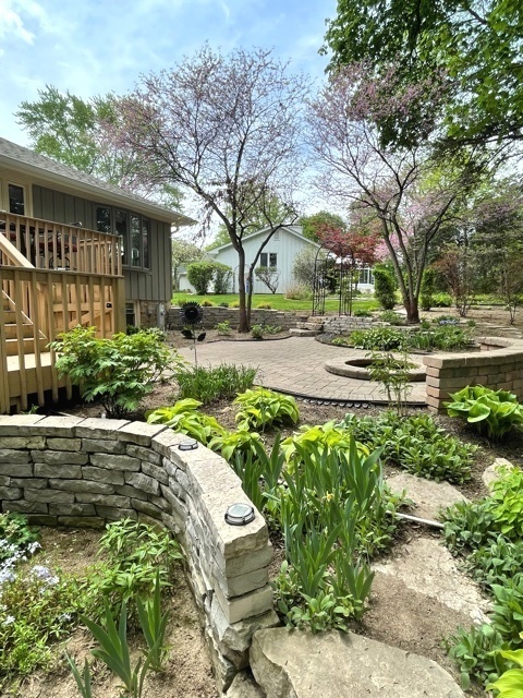 110 Stuarton Drive Wheaton, IL 60189 - Photo 22 of 30 a view of a house with a yard and plants