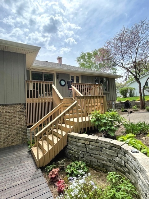 110 Stuarton Drive Wheaton, IL 60189 - Photo 24 of 30 a view of a house with wooden deck