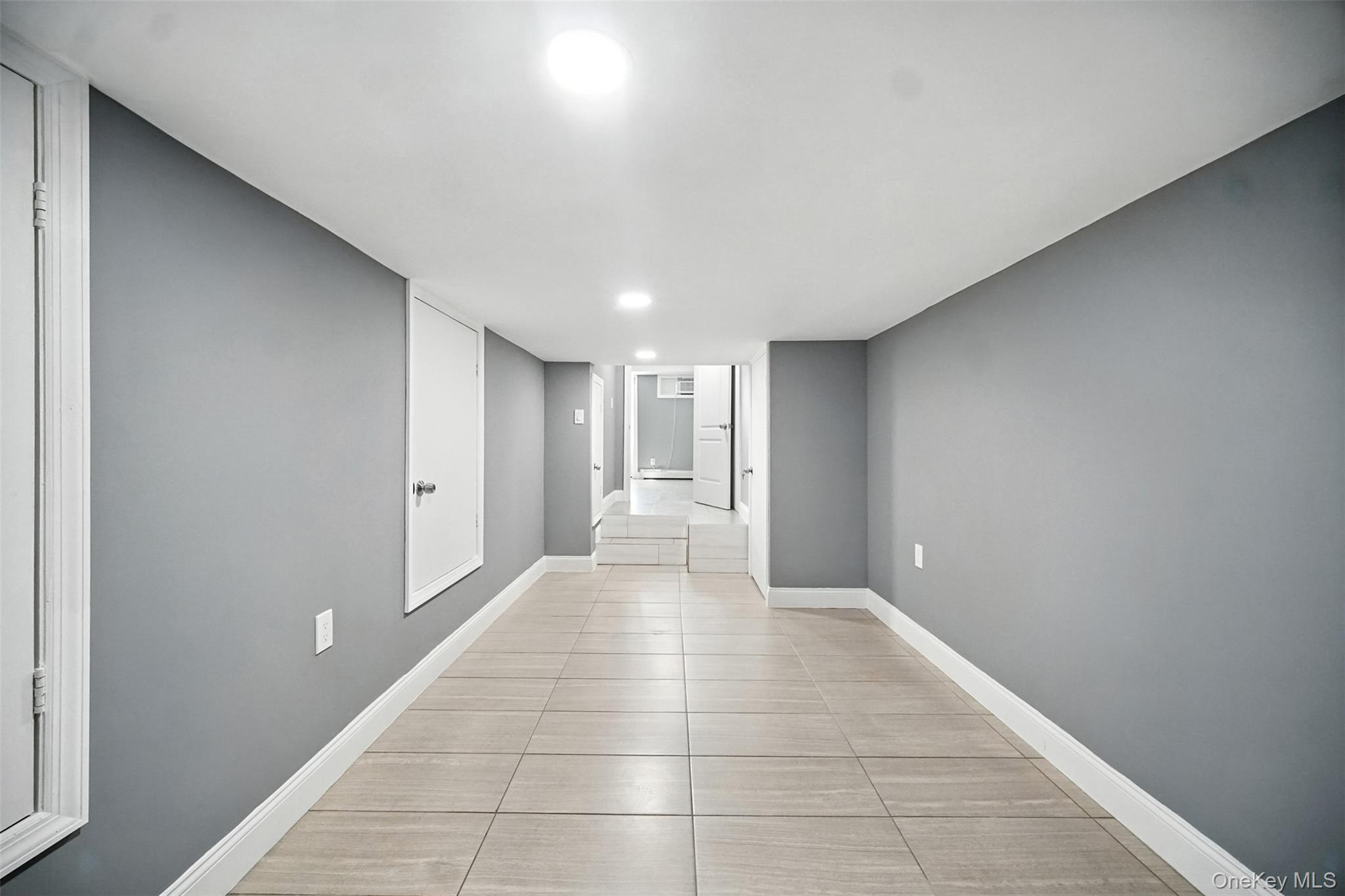 112 Casper Street Valley Stream, NY 11580 - Photo 21 of 26 a view of an empty room and window
