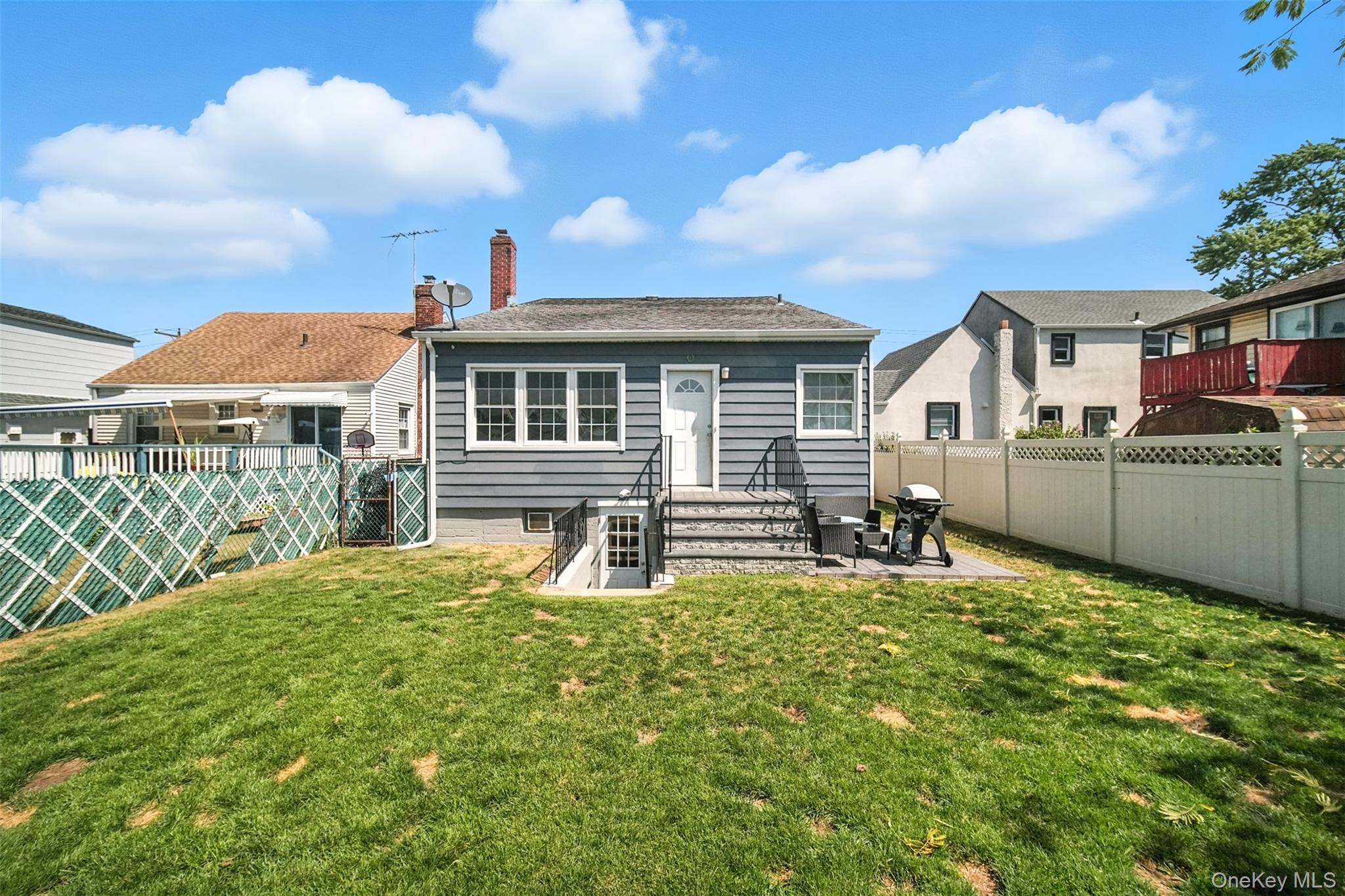 112 Casper Street Valley Stream, NY 11580 - Photo 22 of 26 a view of a house with a yard