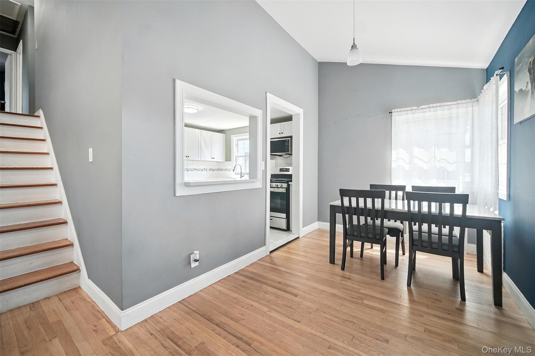 112 Casper Street Valley Stream, NY 11580 - Photo 10 of 26 a view of a dining room with furniture and wooden floor