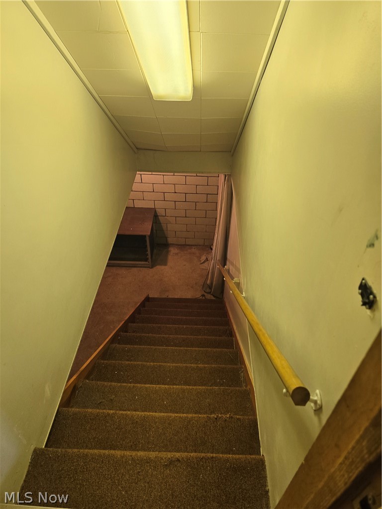 302 South Butler Street Baltic, OH 43804 - Photo 21 of 31 Basement stairs