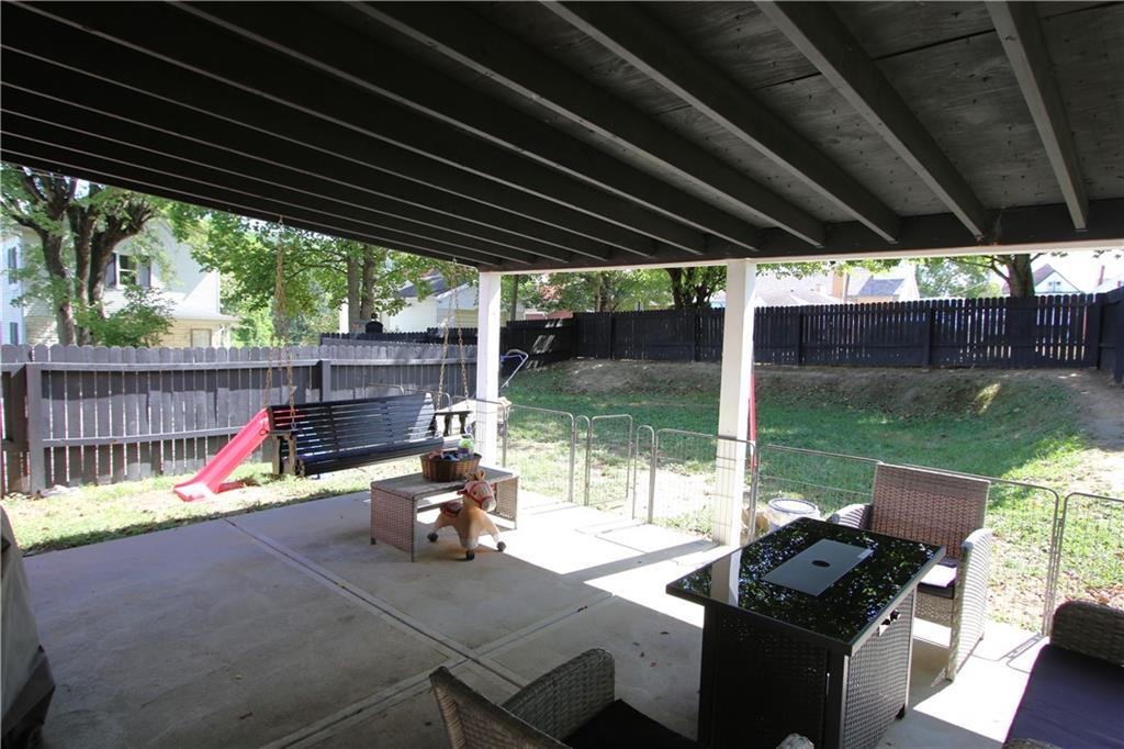 520 Oregon Street Monongahela, PA 15063 - Photo 28 of 31 a view of a patio with a table chairs and a grill