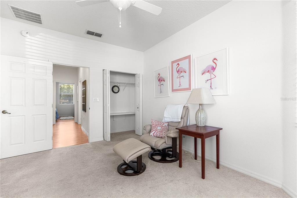 9317 Southwest 94th Loop Ocala, FL 34481 - Photo 28 of 40 a room with furniture and a table