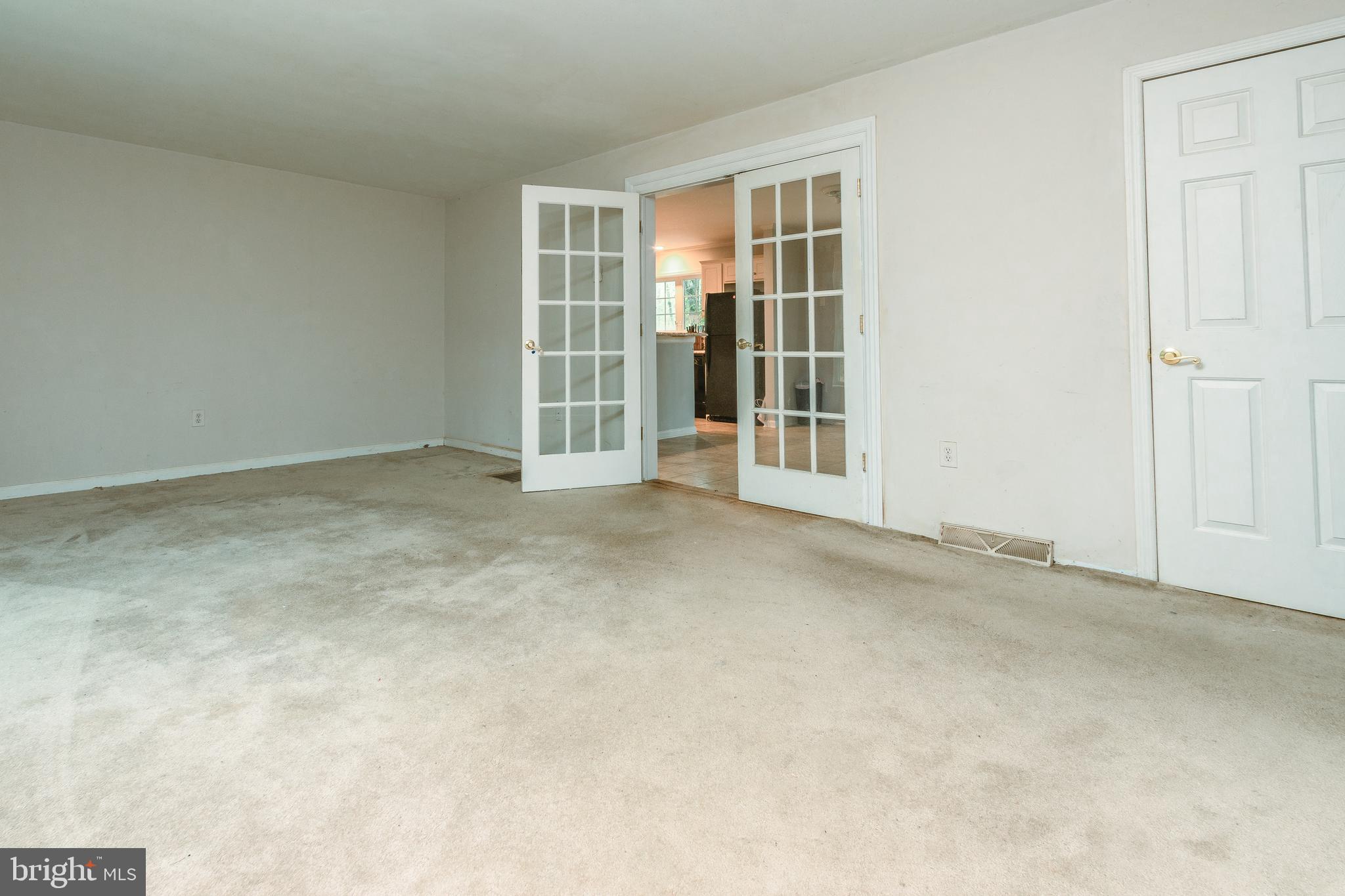 465 North Mill Road Kennett Square, PA 19348 - Photo 9 of 25 Living Room with French door to kitchen