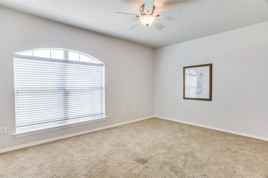 149 Shumard Drive Aledo, TX 76008 - Photo 6 of 12 a view of an empty room with a window