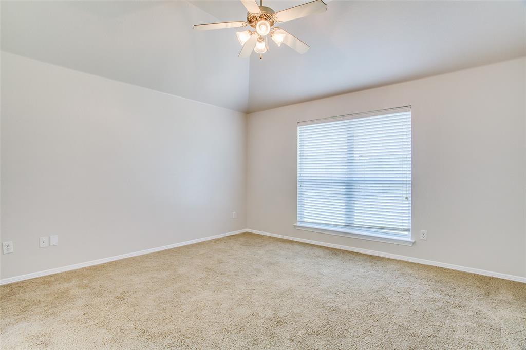 149 Shumard Drive Aledo, TX 76008 - Photo 9 of 12 an empty room with a window and a fan