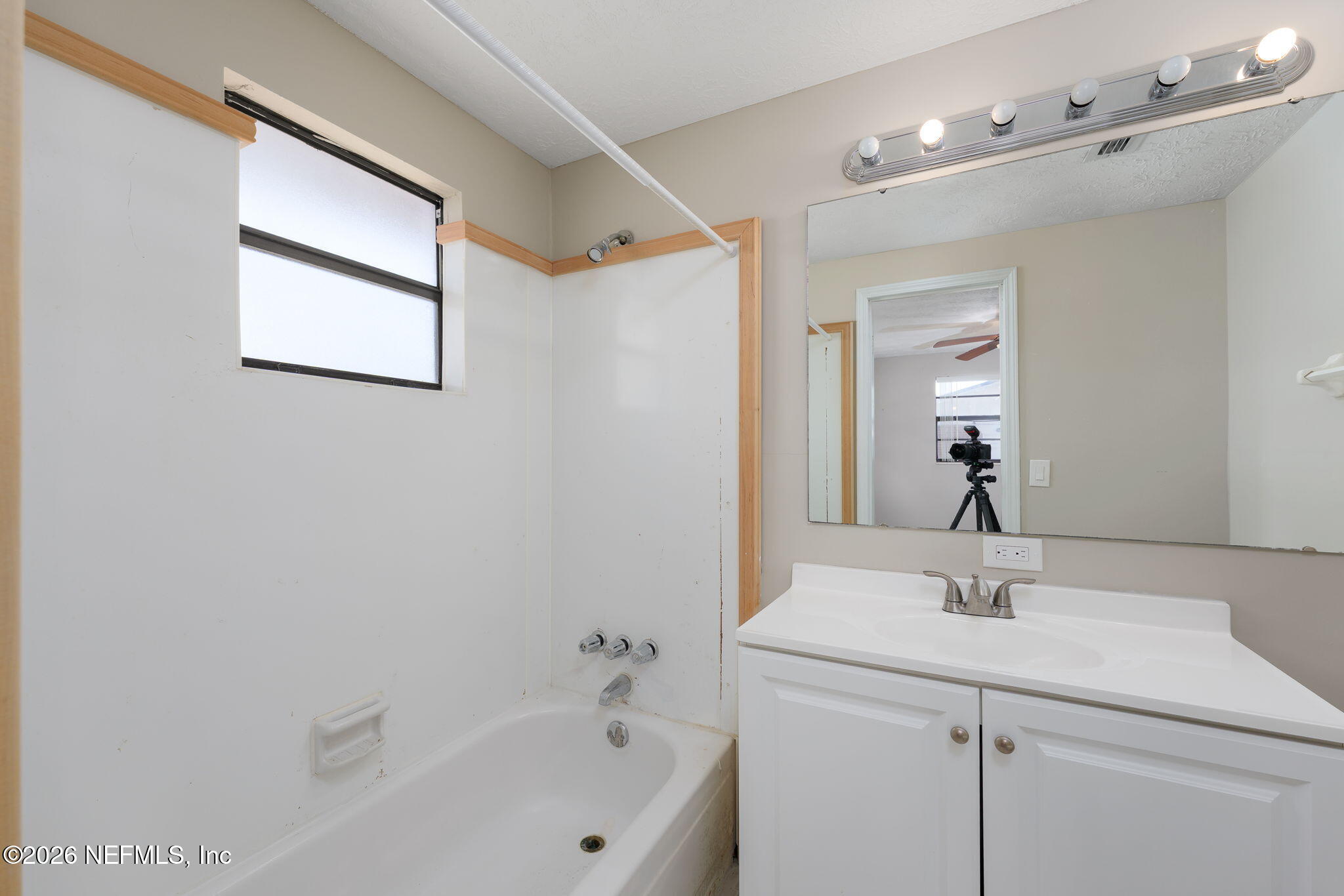 724 Miltondale Road Macclenny, FL 32063 - Photo 21 of 31 a bathroom with a sink a shower and a mirror