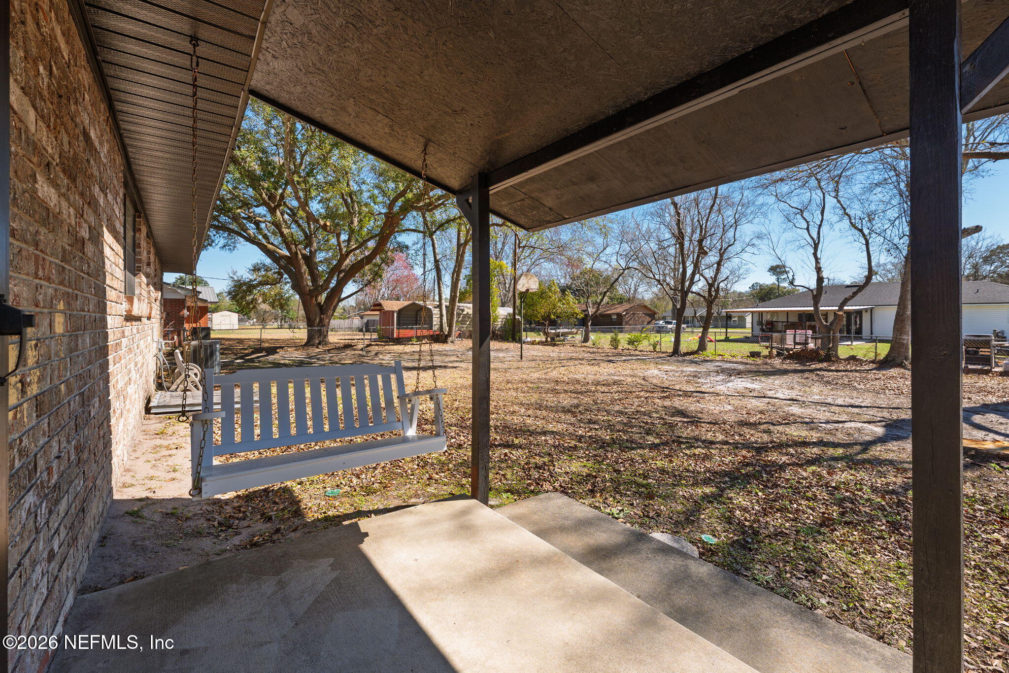 724 Miltondale Road Macclenny, FL 32063 - Photo 24 of 31 a view of a porch with a yard