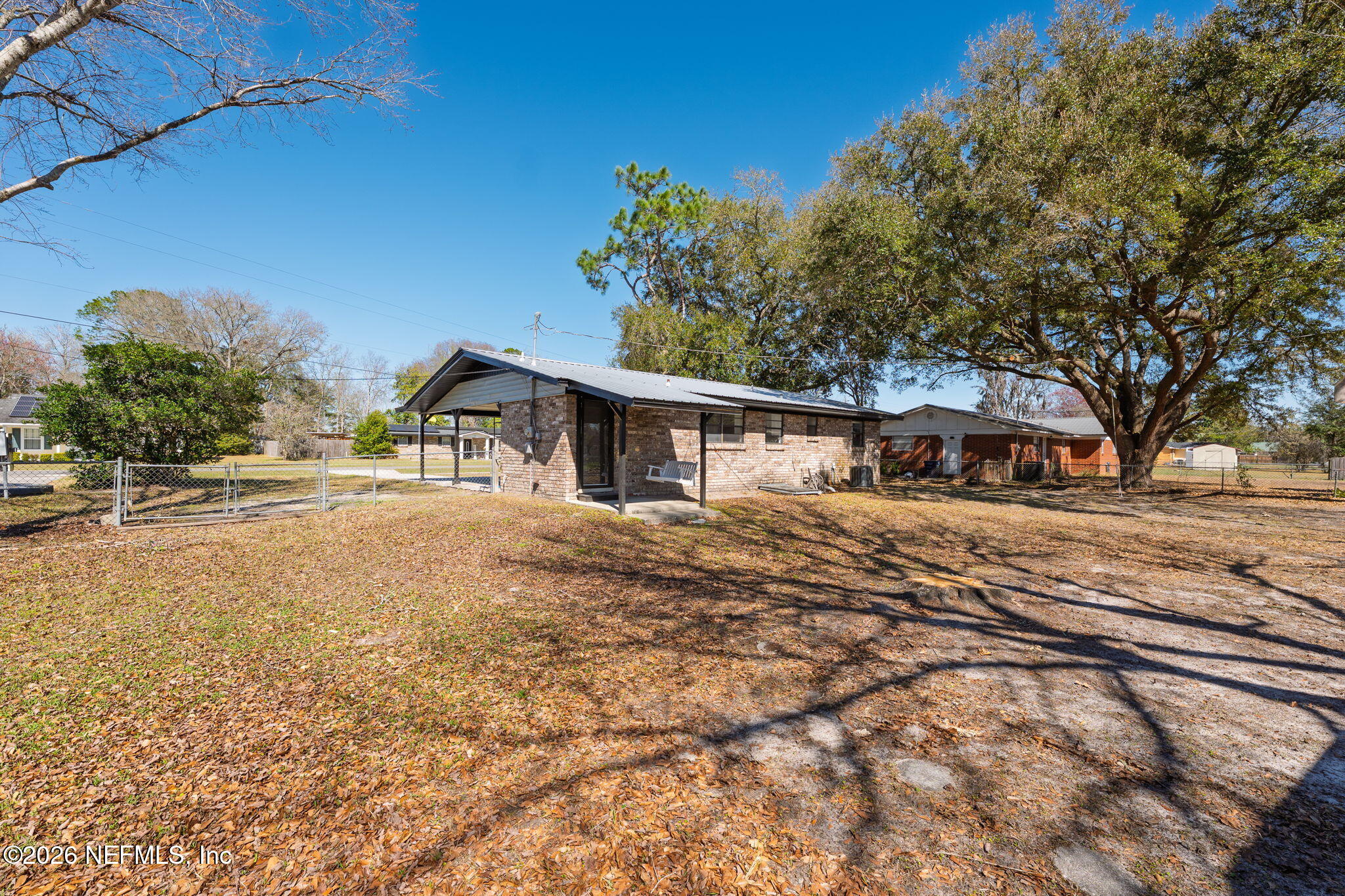 724 Miltondale Road Macclenny, FL 32063 - Photo 25 of 31 a front view of a house with a yard