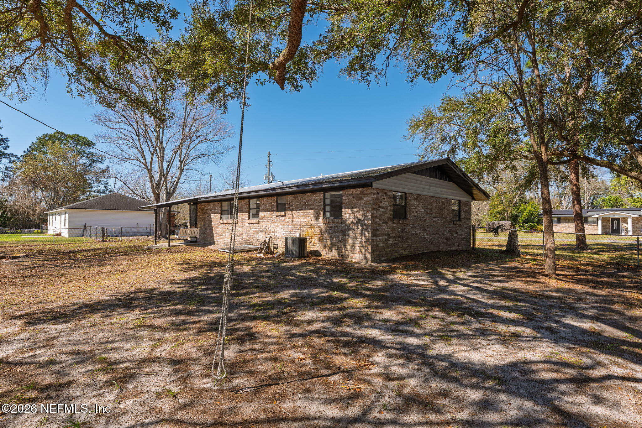 724 Miltondale Road Macclenny, FL 32063 - Photo 27 of 31 a view of a house with a yard