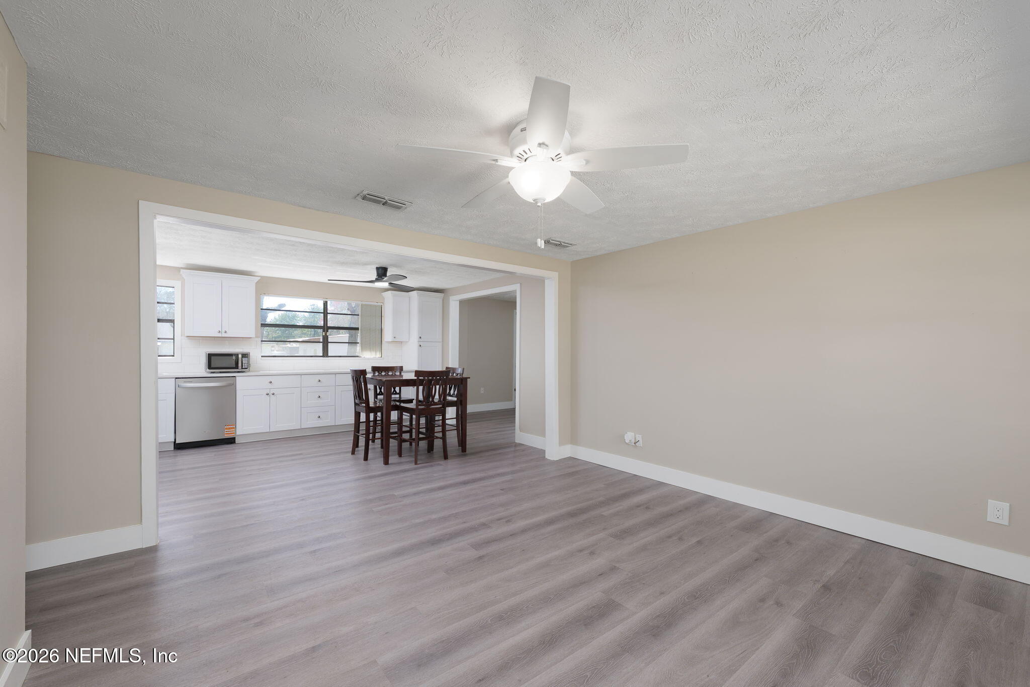 724 Miltondale Road Macclenny, FL 32063 - Photo 6 of 31 a view of a kitchen and dining room