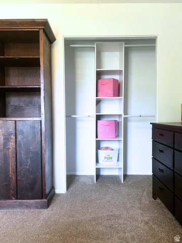570 250 East Parowan, UT 84761 - Photo 19 of 27 Custom closet organization system featuring white shelving and hanging rods