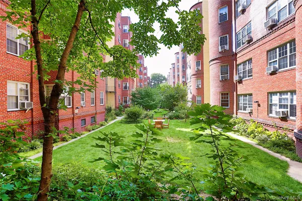 a view of a building with a garden