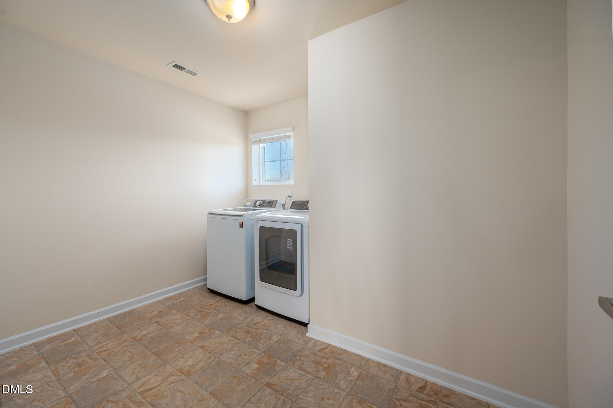 3548 Althorp Drive Raleigh, NC 27616 - Photo 27 of 56 a view of a room with washer and dryer