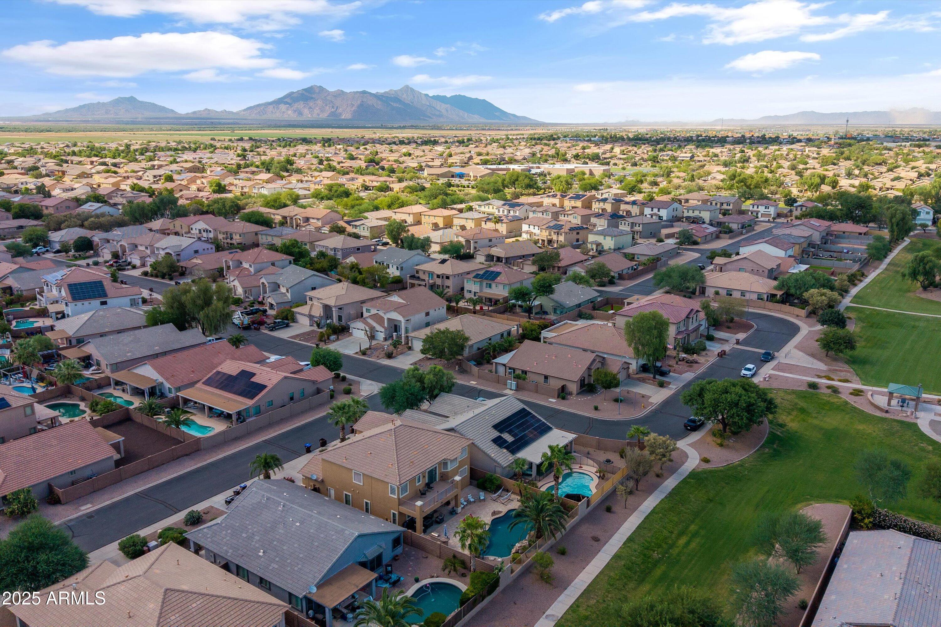 45076 West Rhea Road Maricopa, AZ 85139 - Photo 41 of 43 an aerial view of residential houses with outdoor space