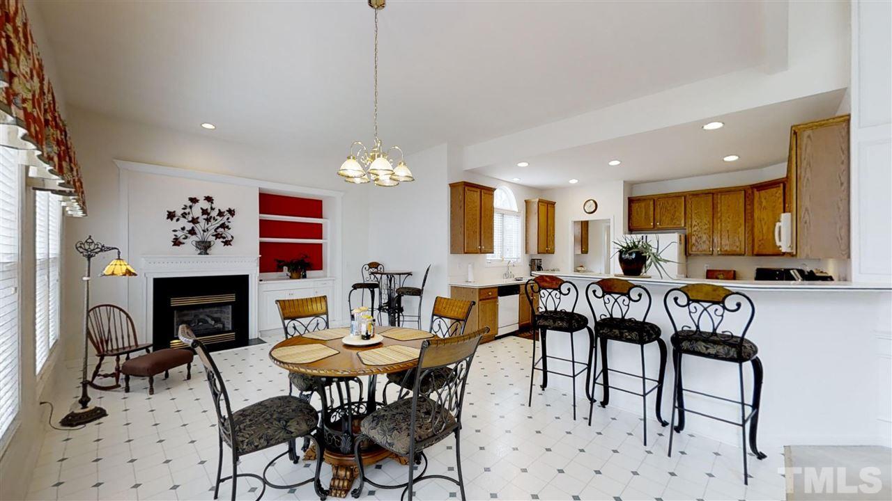3233 Forestville Road Raleigh, NC 27616 - Photo 17 of 25 a view of a dining room with furniture