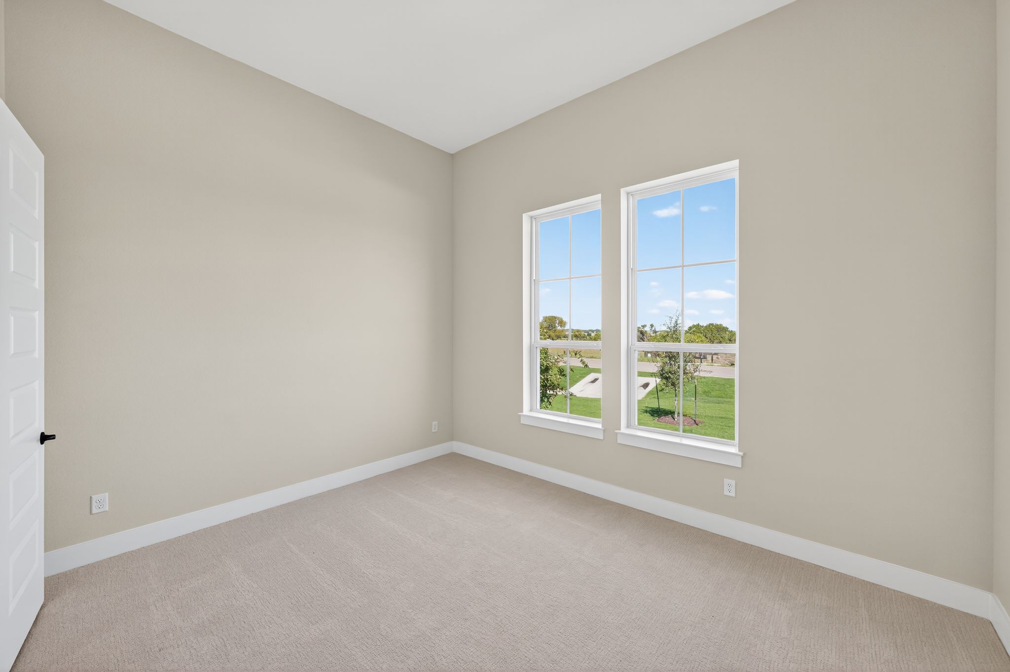 205 Three Rivers Road Georgetown, TX 78633 - Photo 22 of 32 Empty room featuring light colored carpet and baseboards