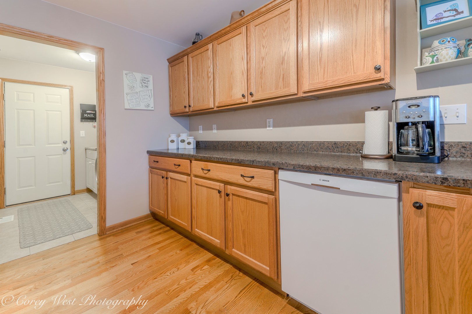 708 Nancy Court Sycamore, IL 60178 - Photo 14 of 29 a kitchen with stainless steel appliances granite countertop a refrigerator and cabinets