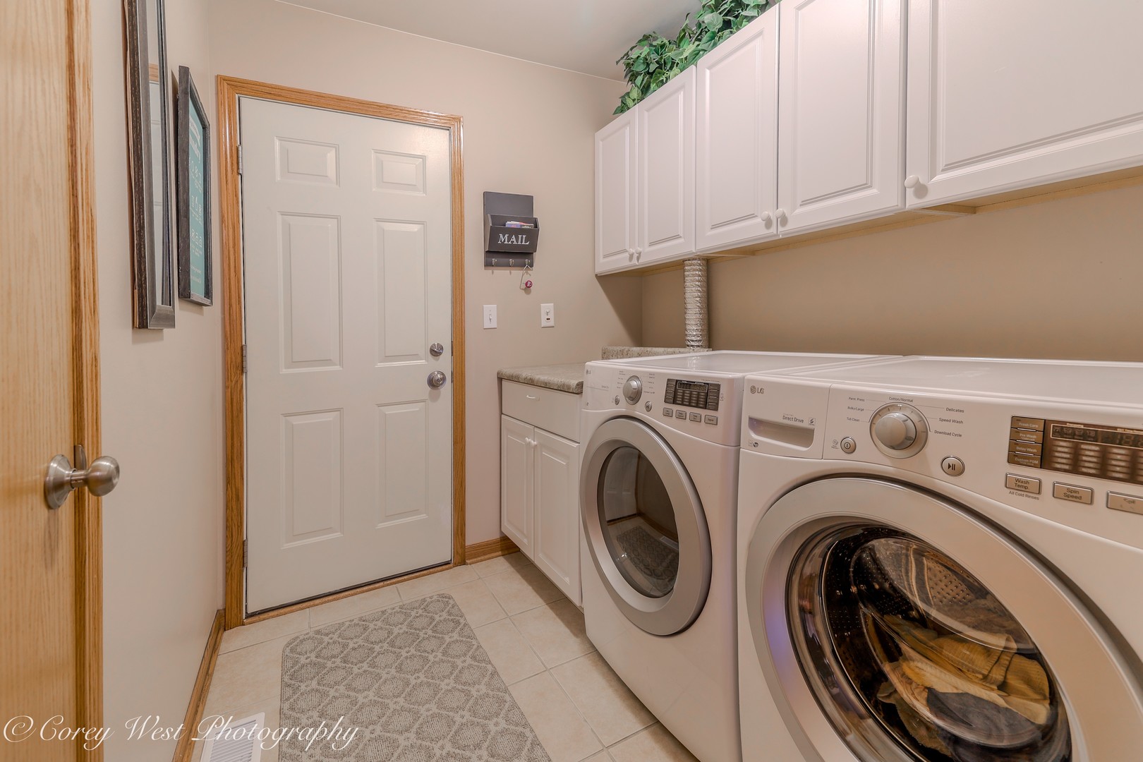 708 Nancy Court Sycamore, IL 60178 - Photo 17 of 29 a view of storage and utility room with washer and dryer