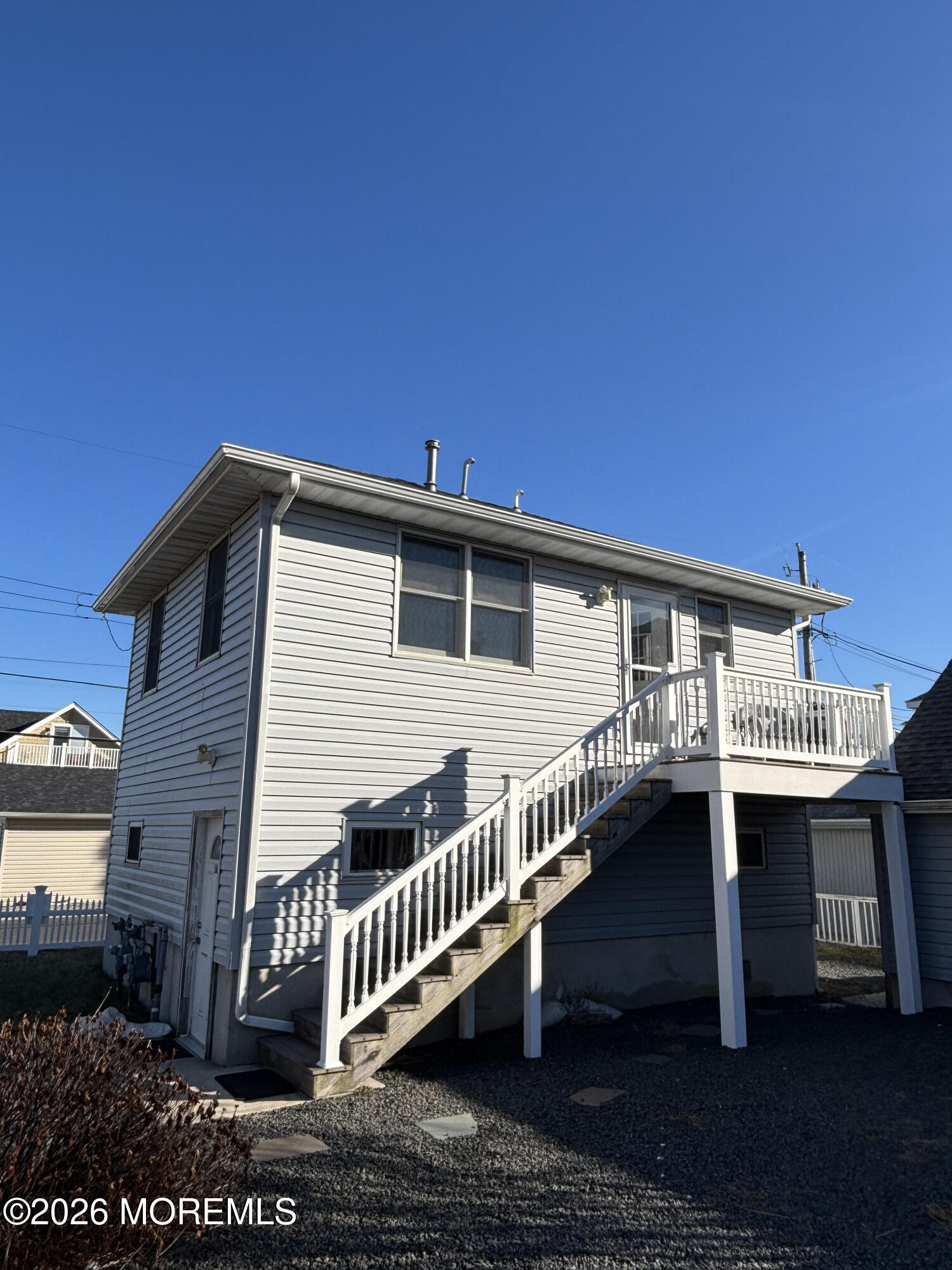 1 Beach Way, Unit A Sea Bright, NJ 07760 - Photo 9 of 13 a view of a house with a yard and deck