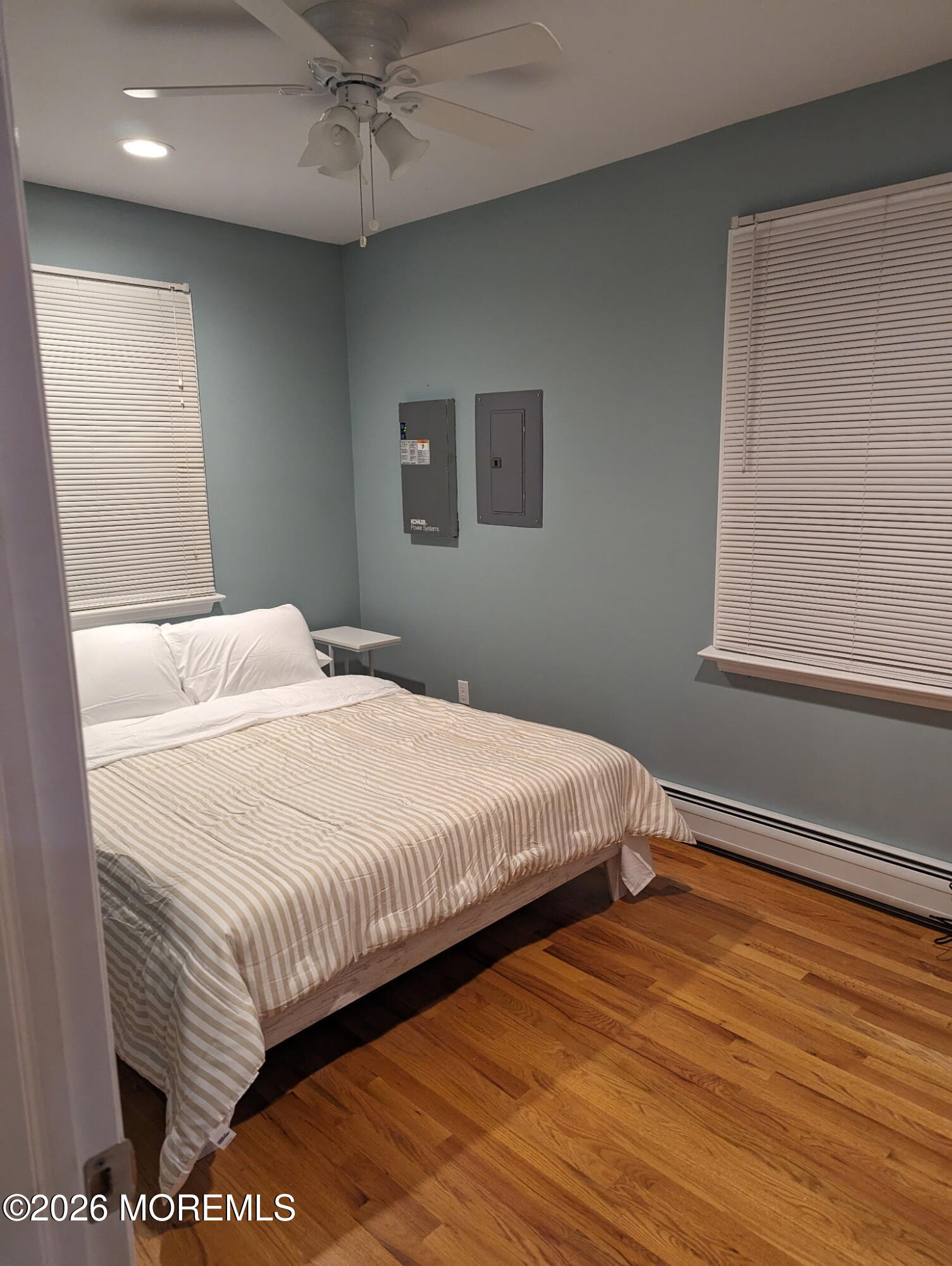1 Beach Way, Unit A Sea Bright, NJ 07760 - Photo 10 of 13 a bedroom with a bed and a window