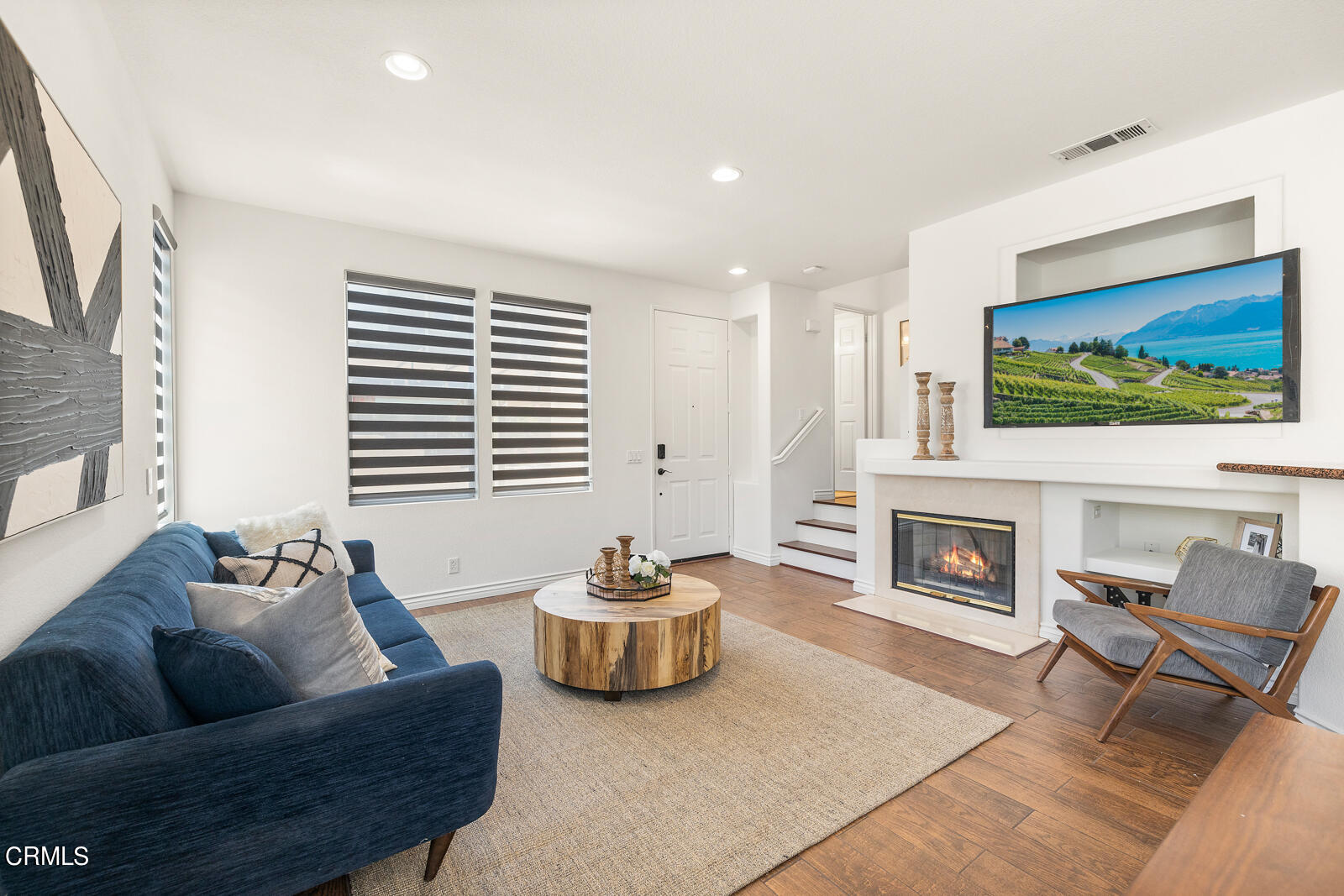 1118 Rosewalk Way Pasadena, CA 91103 - Photo 3 of 19 a living room with furniture a fireplace and a flat screen tv