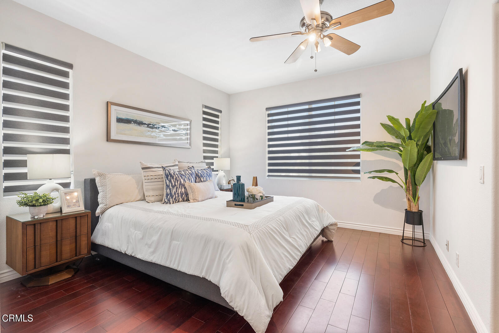 1118 Rosewalk Way Pasadena, CA 91103 - Photo 10 of 19 a bedroom with a large bed and a chandelier