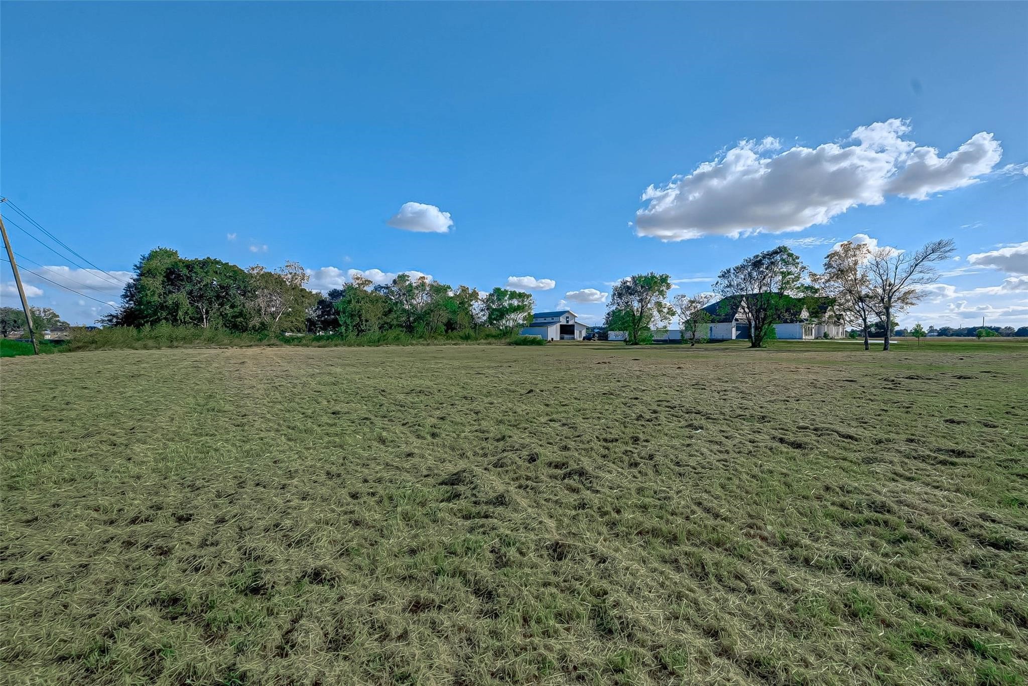 4821 Walters Road Richmond, TX 77469 - Photo 43 of 50 Situated on 3.117 unrestricted acres, this aerial view illustrates the property’s impressive size, open land, and potential for agricultural, residential, or commercial use (buyer to verify)