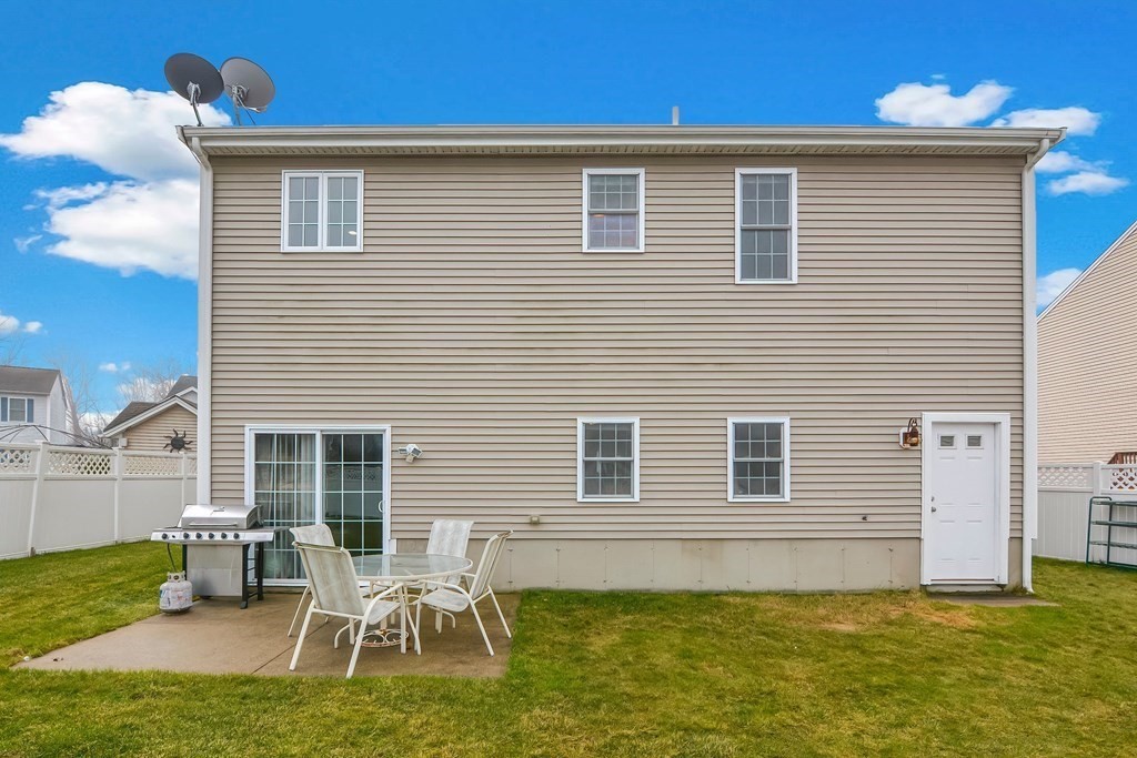 522 Detroit Street Fall River, MA 02721 - Photo 31 of 32 a front view of house with yard and seating space