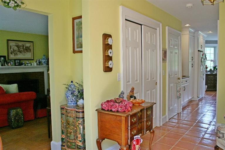 275 Quasons Path Brewster, MA 02631 - Photo 5 of 32 a room that has a bed and a dresser in it