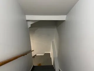 a view of small space with racks on the wall