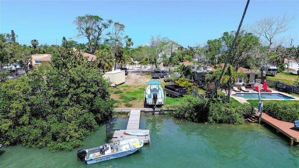 317 12th Avenue Indian Rocks Beach, FL 33785 - Photo 14 of 31 a view of a lake with a house