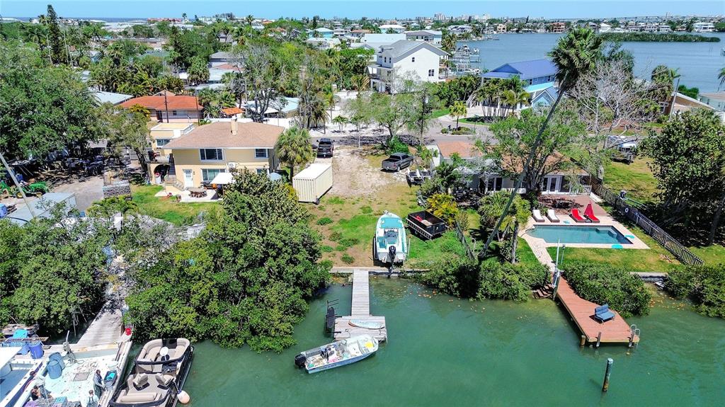317 12th Avenue Indian Rocks Beach, FL 33785 - Photo 15 of 31 a aerial view of a house with a yard basket ball court and outdoor seating