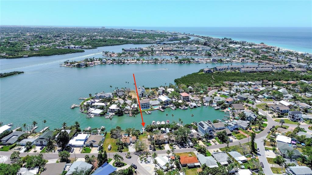 317 12th Avenue Indian Rocks Beach, FL 33785 - Photo 6 of 31 an aerial view of a houses with a lake